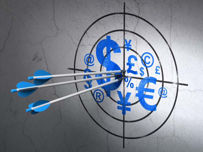 Marketing concept: arrows in Finance Symbol target on wall background